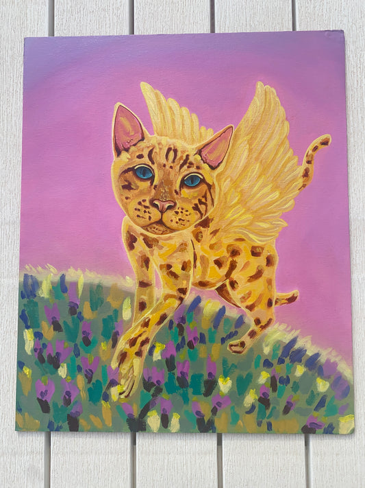Gato alado pintado con acrílicos en tonos amarillos y fucsias que transmite ternura y en mundo de fantasía 46x38 lienzo entablado sin marco
